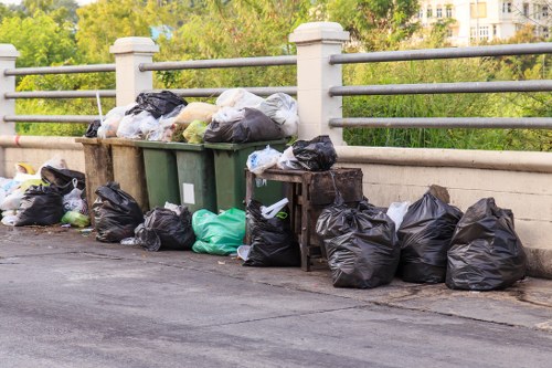Industrial waste being handled by professional removal services in Southfields.